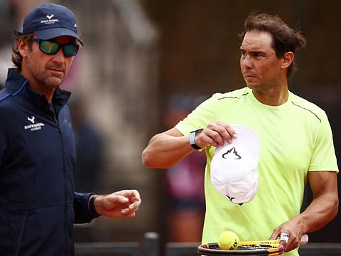 Spain's Rafael Nadal with his coach Carlos Moya during practice in Rome on Tuesday.