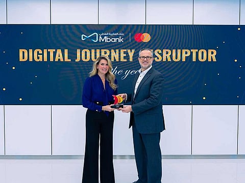 Al Maryah Community Bank receives the 'Digital Journey Disruptor' Award. 