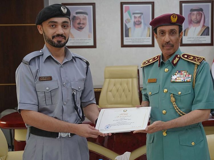 ajman-police-chief-honours-police-officer-1715323552950