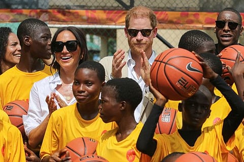 Britain's Prince Harry, Duke of Sussex and Meghan, Duchess of Sussex attend a basketball event in Lagos, Nigeria, May 12, 2024.  