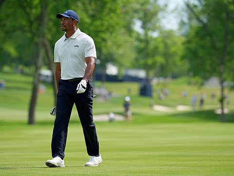 Tiger Woods walks on the 16th hole during a practice round for the PGA Championship golf tournament at Valhalla Golf Club.