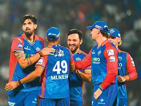 Delhi Capitals’ Ishant Sharma (left) celebrates a wicket with teammates at the Arun Jaitley Stadium in New Delhi.