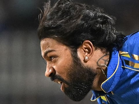 Mumbai Indians’ captain Hardik Pandya bowls during the Indian Premier League cricket match on May 11, 2024. Pandya’s inconsistent batting and poor bowling mirrored Mumbai’s fortunes and affected his captaincy.