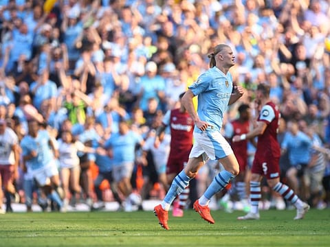 Manchester City's Erling Braut Haaland celebrates after winning the Premier League match against West Ham United at Etihad Stadium on Sunday.
