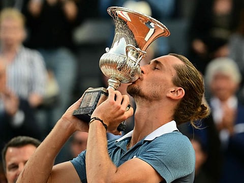 Germany's Alexander Zverev kisses the trophy after winning the men's final against Chile's Nicolas Jarry at the ATP Rome Open tennis tournament at Foro Italico in Rome on Sunday.