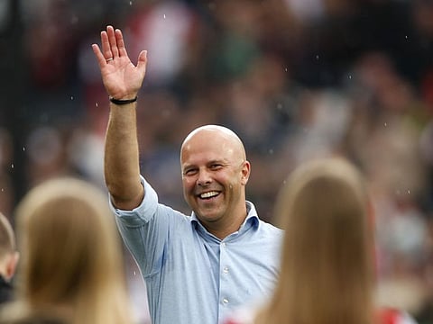 Feyenoord's Dutch headcoach Arne Slot waves during a Dutch Eredivisie first division football match between Feyenoord and Excelsior Rotterdam at the Feyenoord Stadium de Kuip in Rotterdam on May 19.