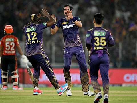 Kolkata Knight Riders' Mitchell Starc celebrates with teammates after taking the wicket of Sunrisers Hyderabad's Shahbaz Ahmed during the Indian Premier League (IPL) Twenty20 first qualifier cricket match at the Narendra Modi Stadium in Ahmedabad on Tuesday.