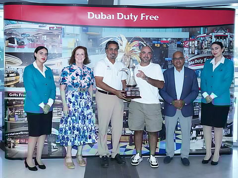 Shames Al Hashemi receiving his trophy from Ramesh Cidambi, COO along with Sinead El Sibai, SVP – Marketing and General Abdullah Al Hashmi, Vice Chairman of the Emirates Golf Federation