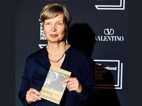 German writter Jenny Erpenbeck poses with her novel "Kairos" on the red carpet upon arrival for the 2024 International Booker Prize 2024 award announcement ceremony, at Tate Modern in central London, on May 21, 2024. 