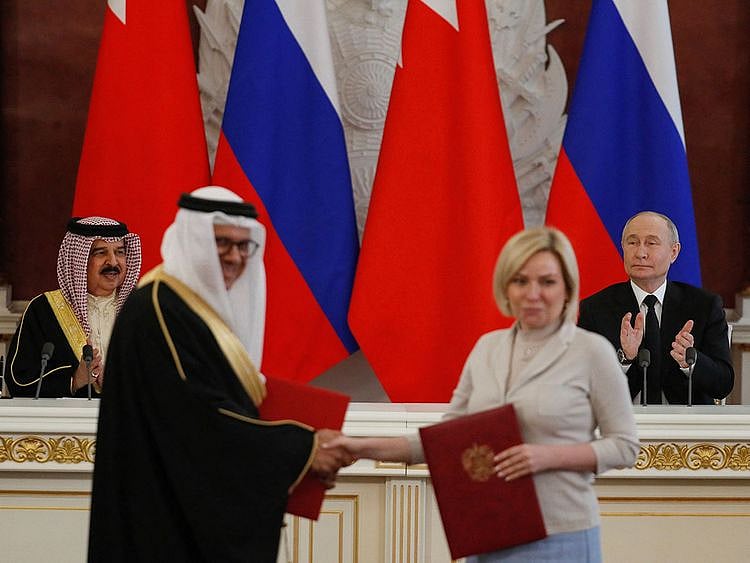King Hamad Bin Eisa Al Khalifa and Russian President Vladimir Putin attend the signing of documents ceremony during their meeting at the Kremlin in Moscow on May 23, 2024.  