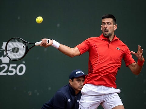 Serbia's Novak Djokovic returns the ball to Netherlands' Tallon Griekspoor during their ATP 250 Geneva Open tennis tournament single quarter final match in Geneva on Thursday.