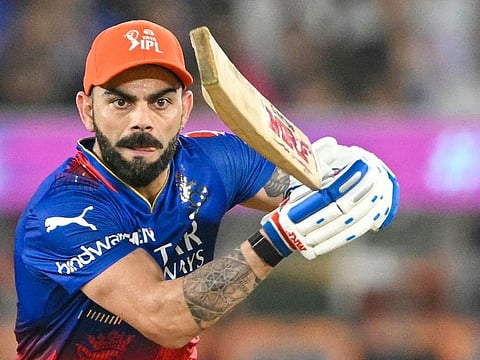 Royal Challengers Bengaluru's Virat Kohli plays a shot during the IPL match against Rajasthan Royals at the Narendra Modi Stadium in Ahmedabad on May 22, 2024. 