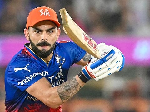 Royal Challengers Bengaluru's Virat Kohli plays a shot during the IPL match against Rajasthan Royals at the Narendra Modi Stadium in Ahmedabad on May 22, 2024. 