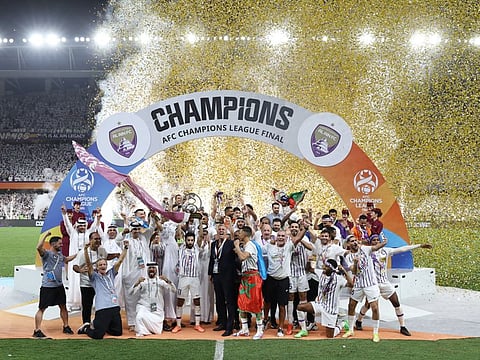 Al Ain players celebrate after winning the AFC Champions League final at Hazza bin Zayed Stadium, Abu Dhabi, on Saturday.