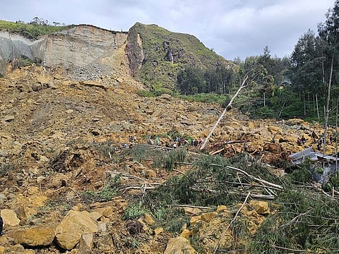 A massive landslide entombed a remote highland community in the early hours of May 24.