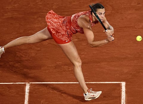 Belarus' Aryna Sabalenka plays a backhand return to Russia's Erika Andreeva during their women's singles match on Court Philippe-Chatrier at the Roland Garros Complex in Paris on Tuesday.