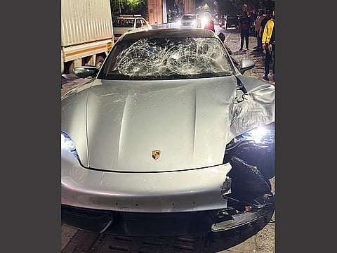 Mangled remains of a Porsche car at  Kalyani Nagar, in Pune, India on Sunday. Two people died in the accident. 