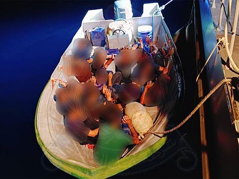 Police intercepted a vessel carrying 18 people of Asian nationalities attempting to leave the country illegally