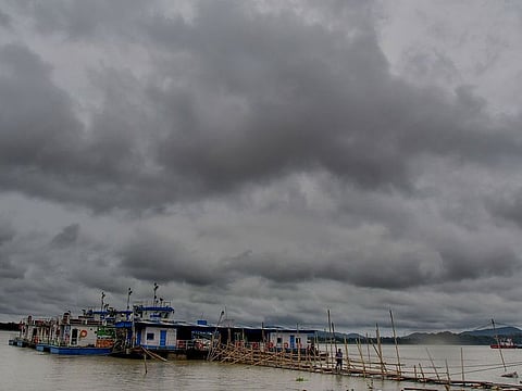 Dark clouds hover over the sky of Guwahati on Monday, following the landfall of Cyclone Remal in India's Assam state.