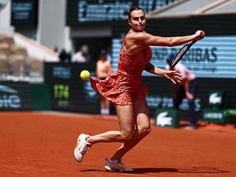 Belarus' Aryna Sabalenka plays a backhand return to US Emma Navarro during their women's singles round of 16 match on Court Philippe-Chatrier at the Roland Garros Complex in Paris on Monday.