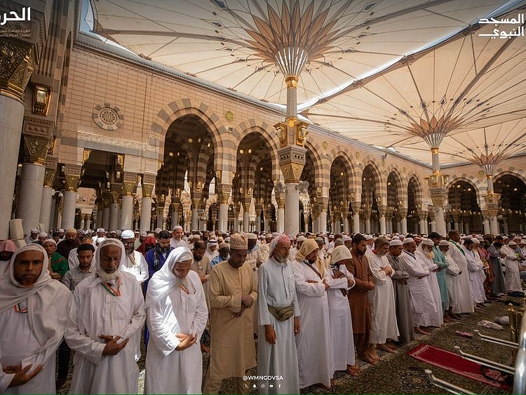 Worshippers perform the congregation Friday noon prayers at the Prophet’s Mosque. 