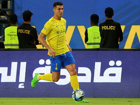 Al Nassr's Portuguese forward Cristiano Ronaldo in action during the Saudi Pro League football match against Al Ittihad at the King Saud University Stadium in Riyadh on May 27.
