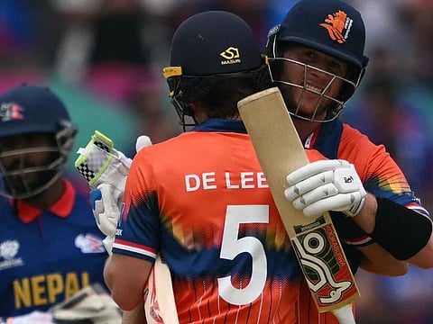 The Netherlands players celebrate after Bas de Leede hit the winning runs against Nepal in the Twenty20 World Cup on Tuesday.