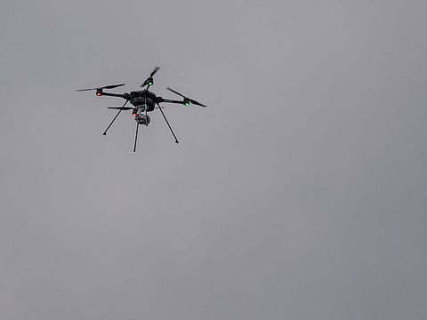 A drone of Japan Ground Self-Defense Force (JGSDF) flies during a live fire exercise at East Fuji Maneuver Area in Gotemba. | UFO sightings might actually be surveillance drones or weapons.