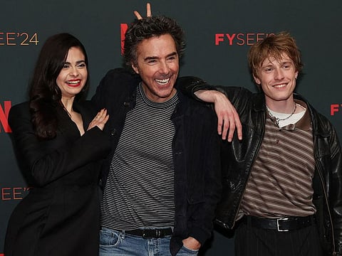 Left to right: Aria Mia Loberti, Shawn Levy, and Louis Hoffman attend the ATAS official screening of Netflix's "All The Light We Cannot See" at FYSEE at Sunset Las Palmas Studios in Los Angeles, California.  