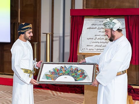Sayyid Theyazin bin Haitham Al Said, the Minister of Culture, Sports and Youth, and Sayyid Asaad bin Al Said, Deputy Prime Minister for International Relations and Cooperation Affairs and the personal representative of His Majesty the Sultan of Oman, are presented with a memnto during the inauguration of the Mandarin Oriental, Muscat
