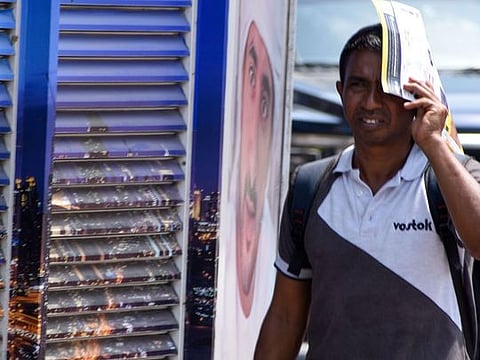 In pictures: How residents navigate the UAE's scorching summer heat