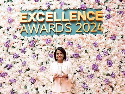 Poonam Bhojani with her Excellence in Education – Best Education Entrepreneur award