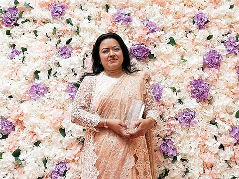 Riddhi Roy with her Excellence in Business – Best in Brand Design & Identity award