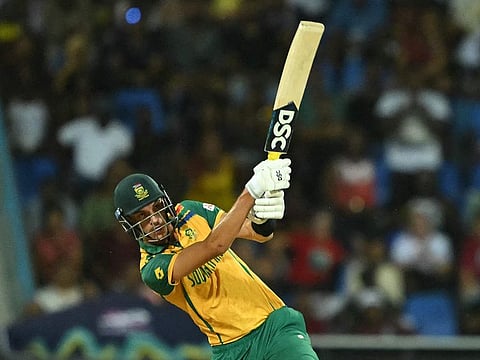 South Africa's Marco Jansen hits a six that leads to his team's victory.