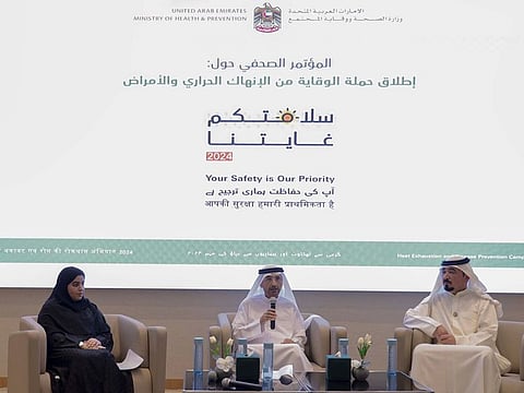 Mohammed Al Zarooni (centre), director of the health ministry’s Representative Office in Sharjah, addressing a press conference in Sharjah on Wednesday to announce details of the heat prevention initiative 