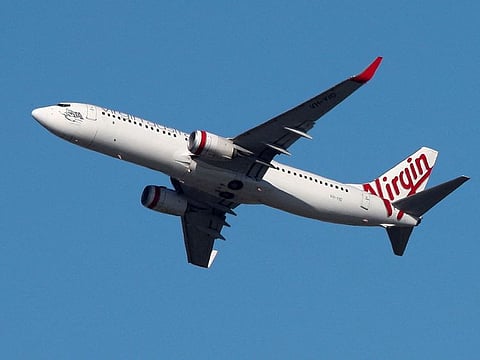 A Virgin Australia Airlines plane takes off from Kingsford Smith International Airport in Sydney, Australia.