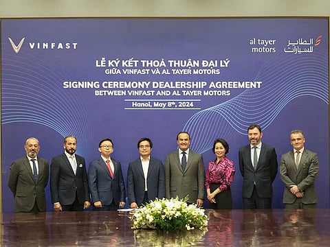 Saeed Al Tayer, Managing Director of Al Tayer Motors, (centre) and Ta Xuan Hien, Chief Executive Officer of VinFast, with senior representatives from VinFast Auto and Al Tayer Motors at the agreement signing in Hanoi, Vietnam.