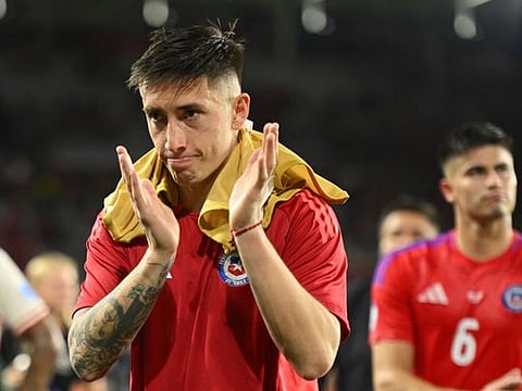 Rodrigo Echeverria of Chile applauds fans after the team's elimination from Copa America on Saturday.
