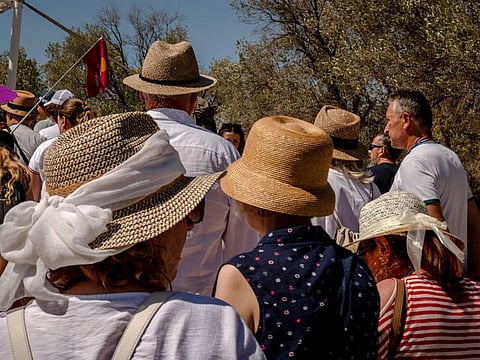 Tourists outside the Acropolis ancient site during high temperatures in Athens on June 28, 2024. Greece has so far been at the epicentre Europe's summer heat, with the country recording its hottest June day.  
