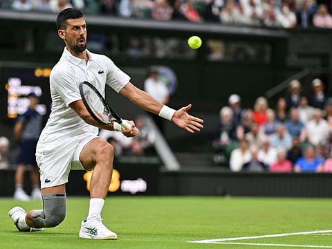 Serbia's Novak Djokovic in action against Czech Republic's Vit Kopriva during their men's singles tennis match on the second day of the 2024 Wimbledon Championships at The All England Lawn Tennis and Croquet Club in Wimbledon on Tuesday.