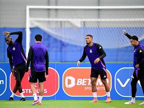 Germany's Antonio Ruediger, Benjamin Henrichs and Jamal Musiala take part in training session.