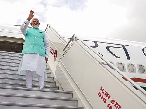 Prime Minister Narendra Modi emplanes for a three-day official visit to Russia and Austria, in New Delhi on Monday.  