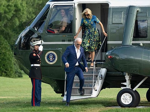 US President Joe Biden and US First Lady Jill Biden step off of Marine One as they return to the White House in Washington, DC, on July 7, 2024, after attending campaign events in Pennsylvania.  