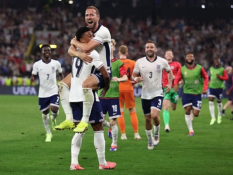 England's forward Harry Kane celebrates with forward Ollie Watkins after winning the Uefa Euro 2024 semi-final football match against the Netherlands at the BVB Stadion in Dortmund on Wednesday.