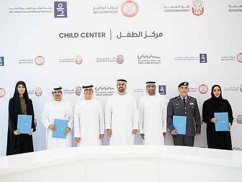 Sheikh Theyab bin Mohamed bin Zayed Al Nahyan (centre) with senior officials from the signing entities including Family Care Authority, Abu Dhabi Early Childhood Authority, the Department of Health – Abu Dhabi, Abu Dhabi Judicial Department, and Abu Dhabi Police