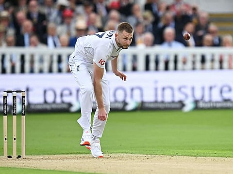 England's Gus Atkinson delivers a ball during play on the first day of the first Test match against West Indies at Lord's Cricket Ground in London on July 10, 2024. 