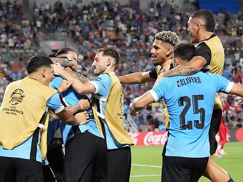Luis Suarez of Uruguay celebrates with teammates after scoring the team's second goal during the CONMEBOL Copa America 2024 third place matchin Charlotte, North Carolina.