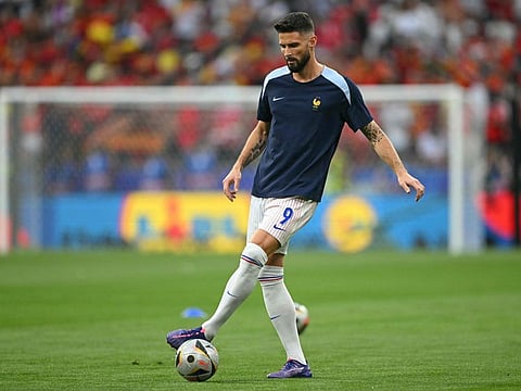 France's forward Olivier Giroud warms up ahead of the Uefa Euro 2024 semi-final football match against Spain at the Munich Football Arena in Munich on July 9.