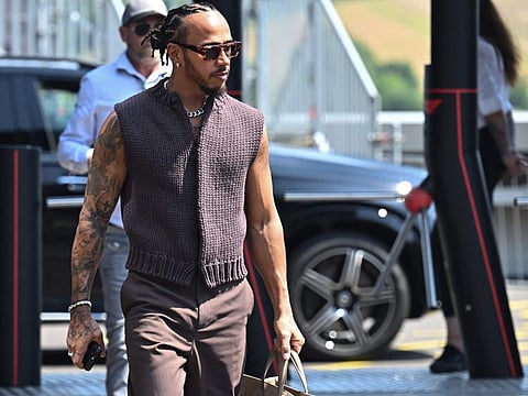 Mercedes' British driver Lewis Hamilton arrives at the Hungaroring race track in Mogyorod near Budapest on Thursday.