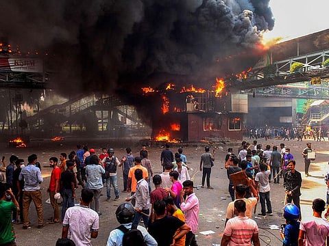 Anti-quota protesters clash with the police in Dhaka on July 18, 2024. 